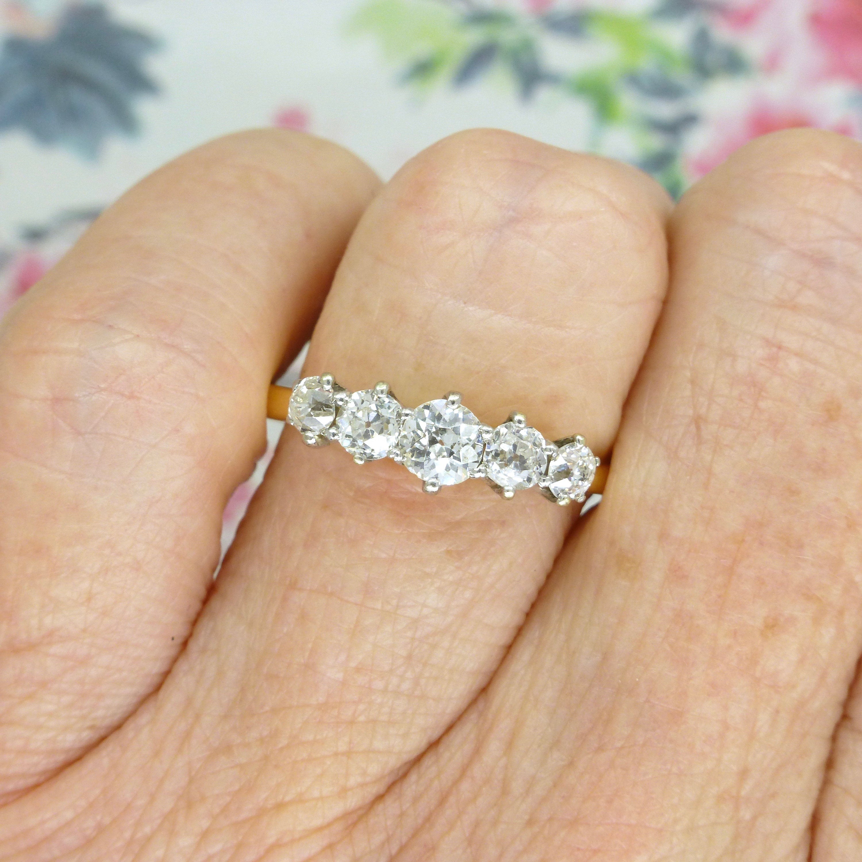 5 stone diamond online ring on hand